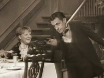 Кадр из видеоролика "'Dinner for one' feat. Sarkozy und Merkel" Кадр из видеоролика "'Dinner for one' feat. Sarkozy und Merkel"